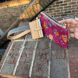 Consuela wristlet, brand new never used, was a gift, sorry no tags. Pristine.